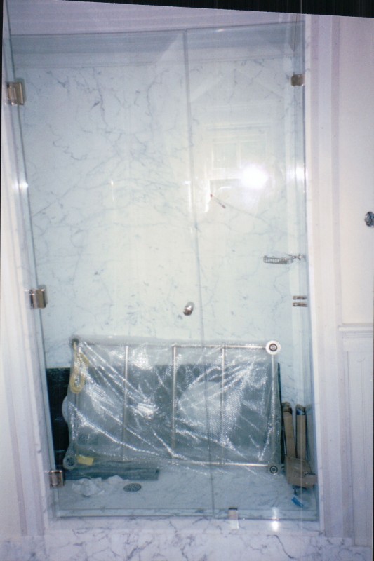 Frameless Door and Panel with Clamps